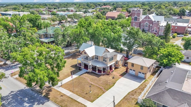 410 S Broadway Ave, Bartow, FL 33830 - aerial perspective of suburban area featuring a tree filled landscape
