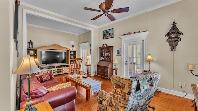 410 S Broadway Ave, Bartow, FL 33830 - living area with wood finished floors, ceiling fan, crown molding, and baseboards