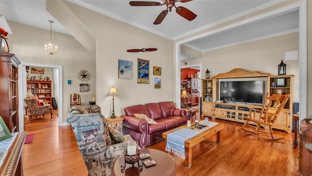 410 S Broadway Ave, Bartow, FL 33830 - living area with wood finished floors, a ceiling fan, a chandelier, and ornamental molding