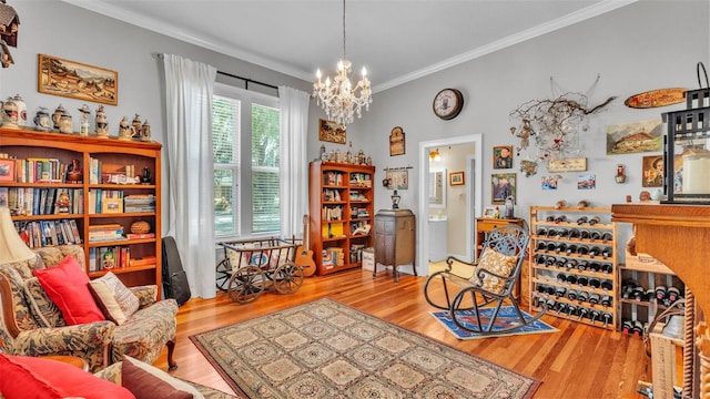 410 S Broadway Ave, Bartow, FL 33830 - sitting room with wood finished floors, a chandelier, and crown molding