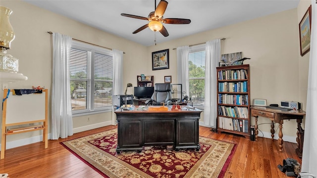 410 S Broadway Ave, Bartow, FL 33830 - office space featuring light wood-style floors, ceiling fan, and baseboards