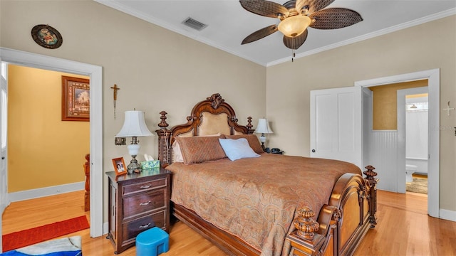 410 S Broadway Ave, Bartow, FL 33830 - bedroom featuring light wood-style floors, crown molding, baseboards, and a ceiling fan
