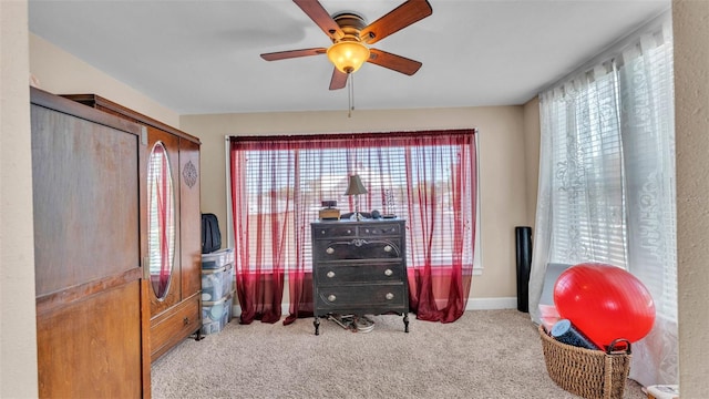 410 S Broadway Ave, Bartow, FL 33830 - bedroom with multiple windows, carpet flooring, and ceiling fan