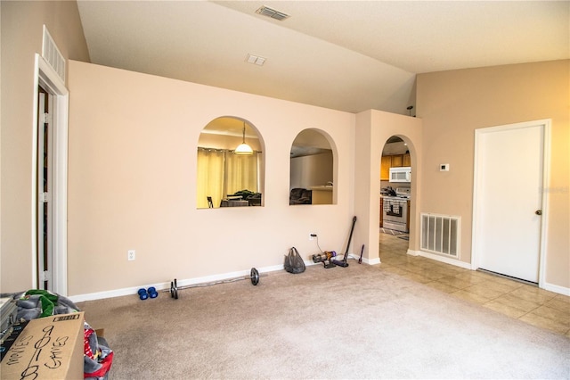 interior space with visible vents, carpet floors, and baseboards