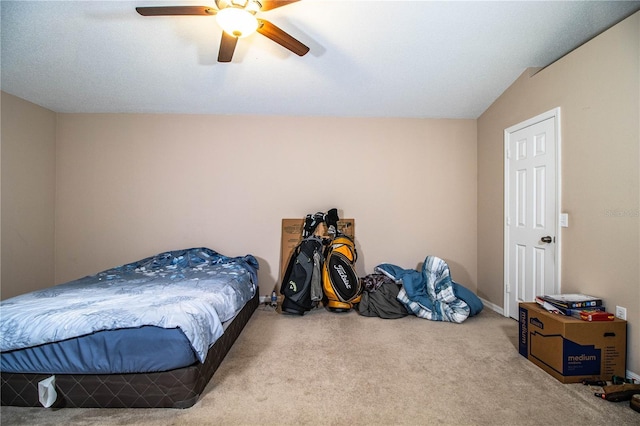 bedroom with baseboards, a ceiling fan, and carpet flooring