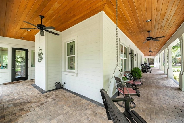 view of patio / terrace with covered porch and ceiling fan