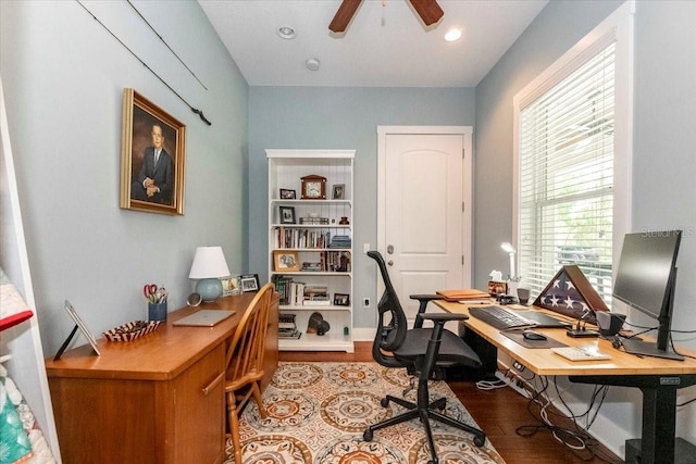 home office featuring a ceiling fan and wood finished floors