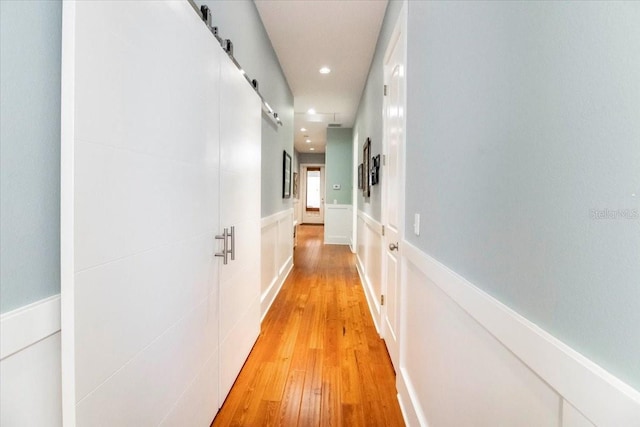 hall featuring recessed lighting and light wood-type flooring