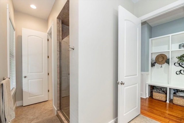 interior space featuring baseboards and recessed lighting