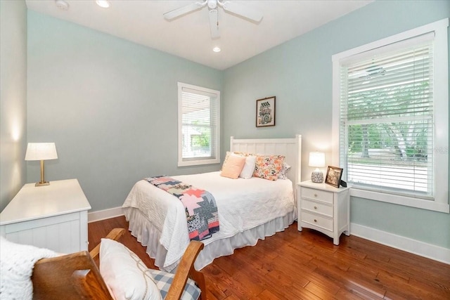 bedroom with a ceiling fan, baseboards, recessed lighting, and hardwood / wood-style floors