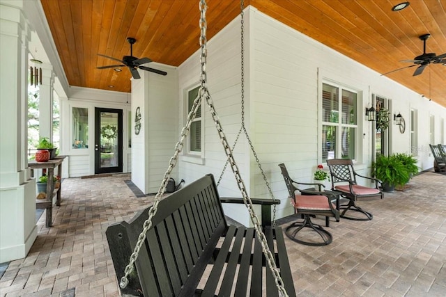 view of patio featuring a porch and a ceiling fan