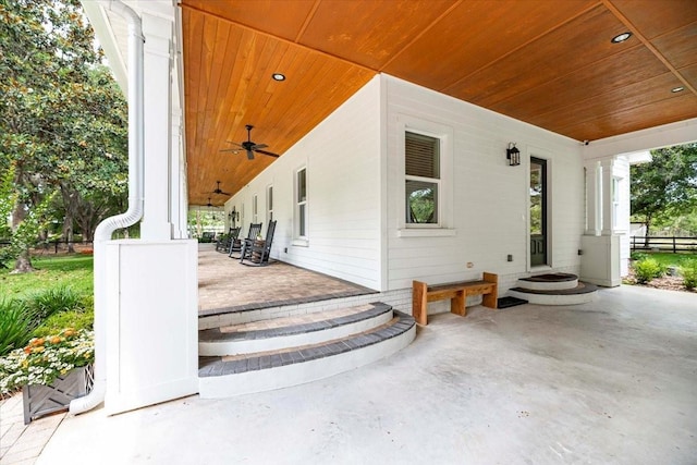 view of patio with a porch and ceiling fan