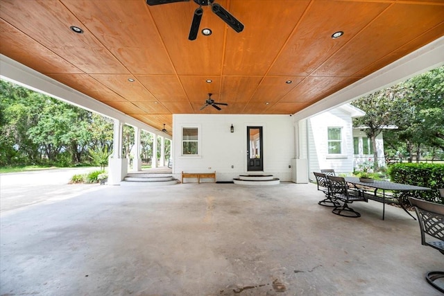 view of patio / terrace with ceiling fan, outdoor dining area, and entry steps