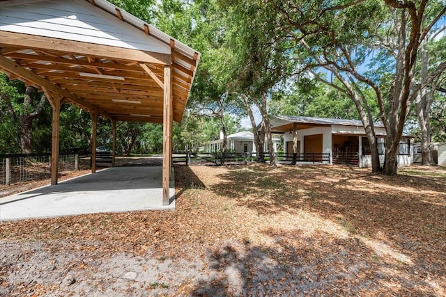 view of yard featuring a carport