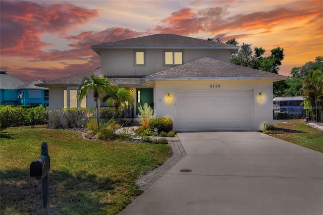 4116 4th Ave NE, Bradenton, FL 34208 - traditional home with fence, stucco siding, roof with shingles, and a front yard