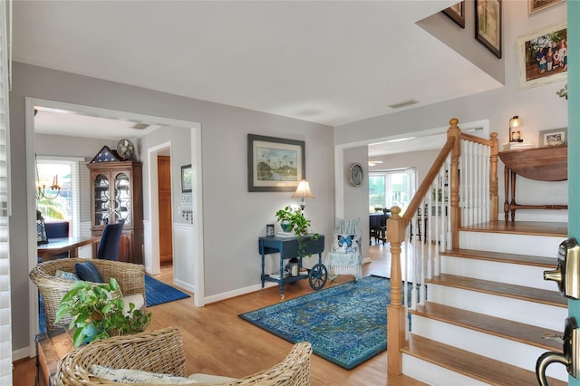4116 4th Ave NE, Bradenton, FL 34208 - entryway with light wood-type flooring, baseboards, visible vents, and stairway