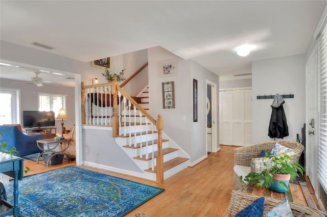 4116 4th Ave NE, Bradenton, FL 34208 - stairway featuring baseboards, ceiling fan, and wood finished floors