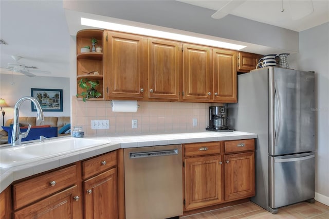 4116 4th Ave NE, Bradenton, FL 34208 - kitchen with ceiling fan, appliances with stainless steel finishes, open shelves, a sink, and tile countertops