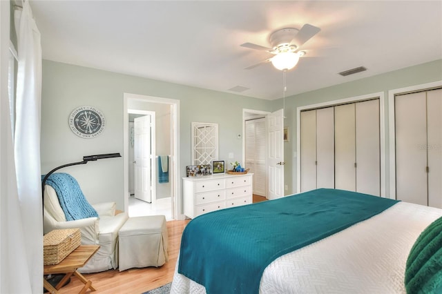 4116 4th Ave NE, Bradenton, FL 34208 - bedroom with a ceiling fan, visible vents, light wood-type flooring, multiple closets, and ensuite bath