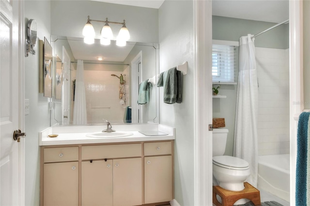 4116 4th Ave NE, Bradenton, FL 34208 - bathroom featuring toilet, shower / tub combo with curtain, and vanity
