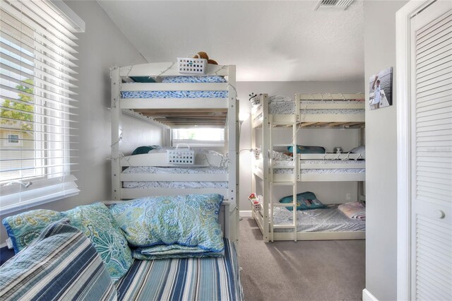 4116 4th Ave NE, Bradenton, FL 34208 - bedroom with visible vents and carpet flooring