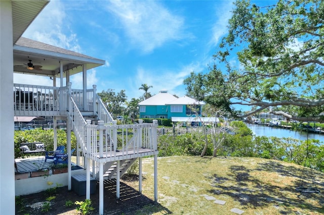 4116 4th Ave NE, Bradenton, FL 34208 - view of yard featuring a water view, ceiling fan, and stairway