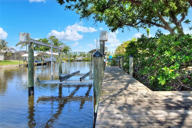 4116 4th Ave NE, Bradenton, FL 34208 - dock area with boat lift and a water view