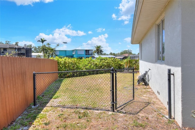 4116 4th Ave NE, Bradenton, FL 34208 - view of gate with fence and a lawn