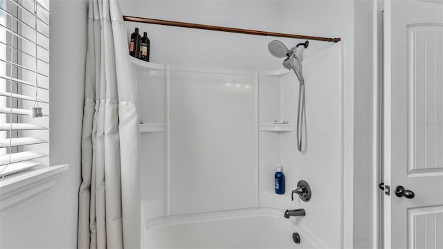 full bathroom with shower / tub combo