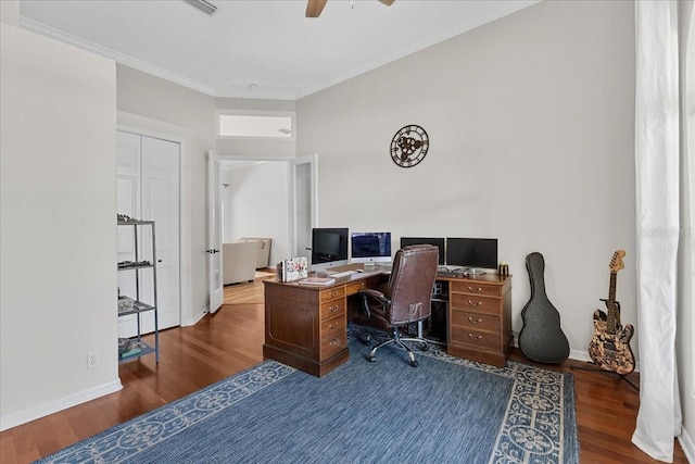 home office featuring wood finished floors, a ceiling fan, crown molding, and baseboards