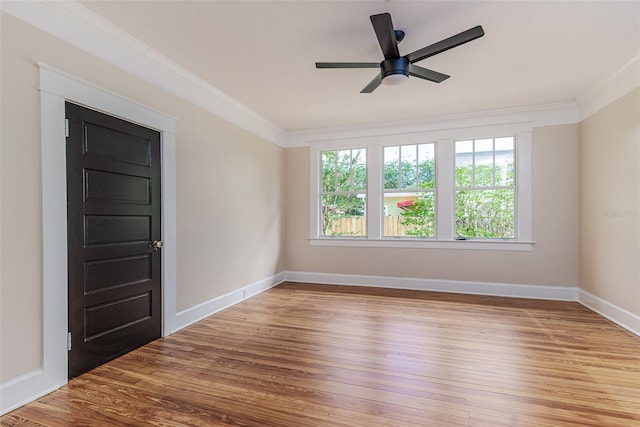 746 Mississippi Ave, Lakeland, FL 33801 - empty room featuring ornamental molding, ceiling fan, wood finished floors, and baseboards