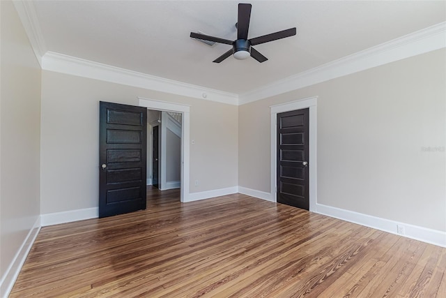 746 Mississippi Ave, Lakeland, FL 33801 - empty room featuring wood finished floors, ceiling fan, and crown molding