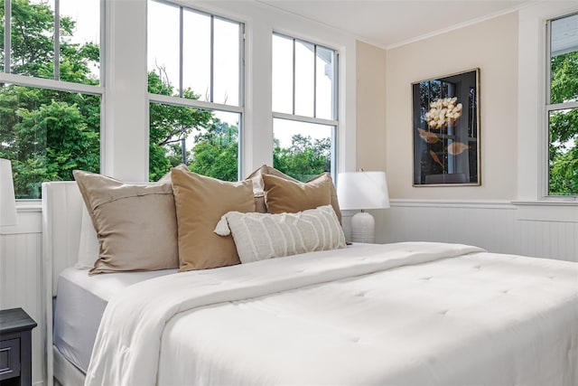 746 Mississippi Ave, Lakeland, FL 33801 - bedroom featuring crown molding and wainscoting