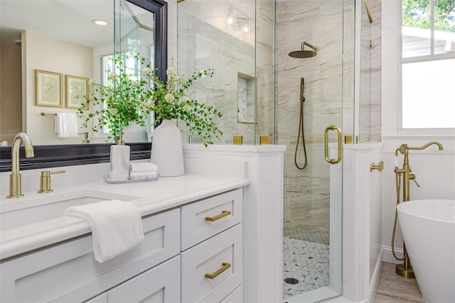 746 Mississippi Ave, Lakeland, FL 33801 - full bathroom featuring a stall shower, a freestanding bath, and plenty of natural light