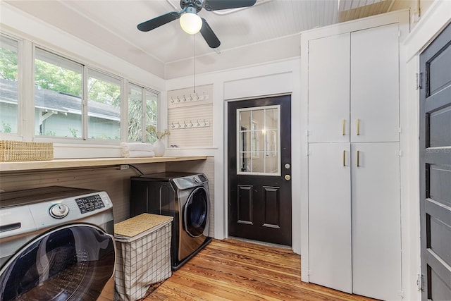 746 Mississippi Ave, Lakeland, FL 33801 - washroom with cabinet space, a ceiling fan, light wood-style flooring, and separate washer and dryer