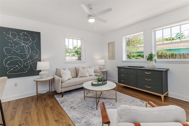 746 Mississippi Ave, Lakeland, FL 33801 - living area with a ceiling fan, wood finished floors, and baseboards