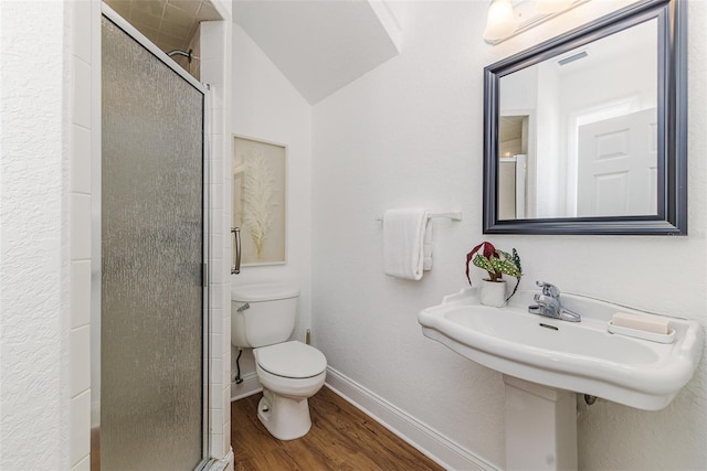 746 Mississippi Ave, Lakeland, FL 33801 - full bath with toilet, a stall shower, visible vents, baseboards, and wood finished floors