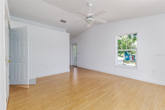 746 Mississippi Ave, Lakeland, FL 33801 - unfurnished room featuring visible vents, a healthy amount of sunlight, lofted ceiling, and light wood-style flooring