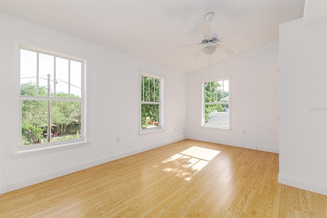 746 Mississippi Ave, Lakeland, FL 33801 - spare room featuring baseboards, light wood-type flooring, a ceiling fan, and lofted ceiling