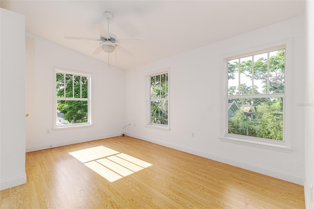 746 Mississippi Ave, Lakeland, FL 33801 - unfurnished room featuring ceiling fan, baseboards, lofted ceiling, and light wood-style floors