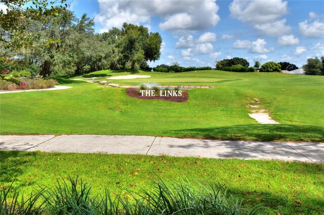 525 Eagle Run, Lakeland, FL 33809 - view of home's community featuring golf course view and a lawn