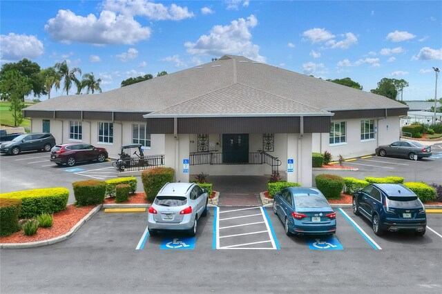 525 Eagle Run, Lakeland, FL 33809 - view of property featuring uncovered parking