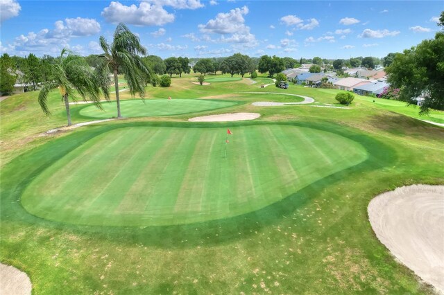 525 Eagle Run, Lakeland, FL 33809 - view of community featuring a lawn, view of scattered trees, and view of golf course