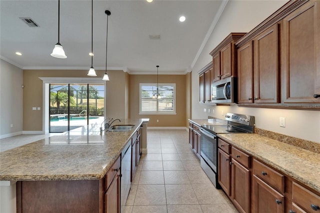 1295 Osprey Landing Dr, Lakeland, FL 33813 - kitchen featuring crown molding, plenty of natural light, stainless steel appliances, and baseboards