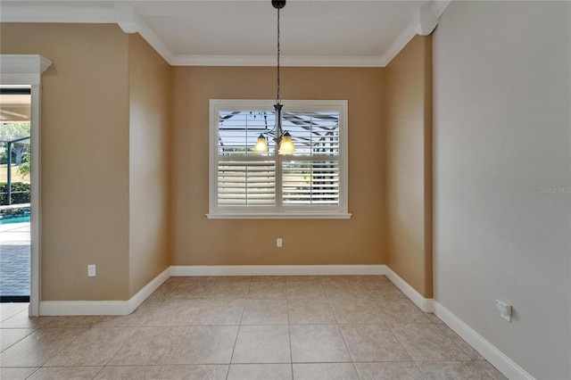 1295 Osprey Landing Dr, Lakeland, FL 33813 - unfurnished dining area featuring crown molding, a chandelier, and baseboards
