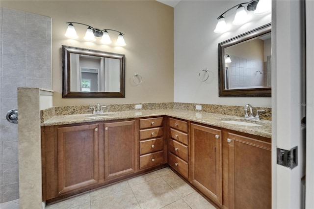 1295 Osprey Landing Dr, Lakeland, FL 33813 - full bathroom featuring tile patterned floors, a tile shower, double vanity, and a sink
