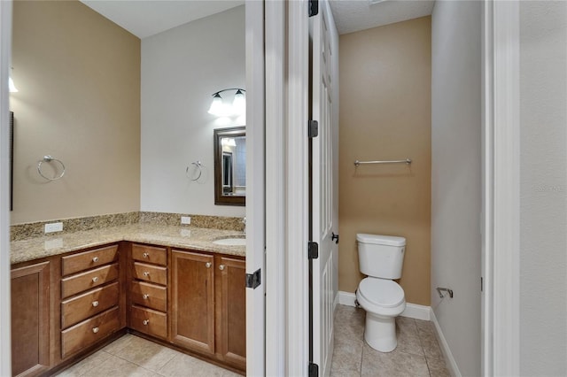 1295 Osprey Landing Dr, Lakeland, FL 33813 - bathroom featuring toilet, tile patterned flooring, and vanity