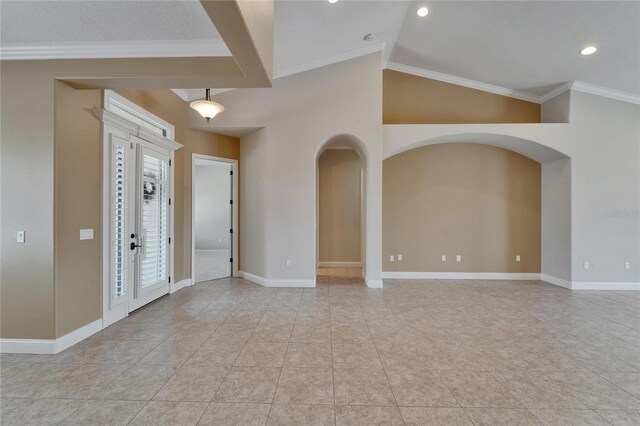 1295 Osprey Landing Dr, Lakeland, FL 33813 - interior space with light tile patterned floors, crown molding, arched walkways, and baseboards