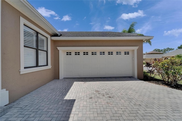1295 Osprey Landing Dr, Lakeland, FL 33813 - garage with decorative driveway
