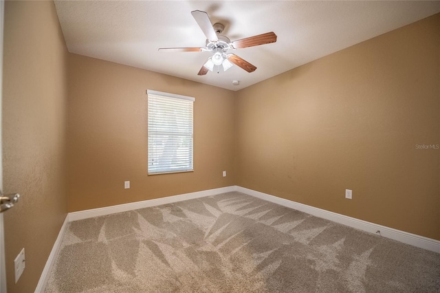 2933 Blackwater Oaks Dr, Mulberry, FL 33860 - empty room with baseboards, a ceiling fan, and carpet floors